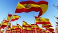 Lots of Spain flags fluttering in the wind Royalty Free Stock Photo