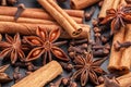 Lots of three spices for mulled wine Ã¢â¬â star anise, cinnamon and clove, macro Royalty Free Stock Photo