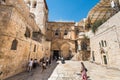 Lots of tourists and pilgrims at the  square in front of the entrance to the Church of the Holy Sepulchre in Jerusalem, Israel Royalty Free Stock Photo