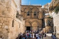 Lots of tourists and pilgrims at the square in front of the entrance to the Church of the Holy Sepulchre in Jerusalem, Israel