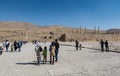 Lots tourists at the Ruins of the Gate of All Nations in the Persepolis in Shiraz, Iran. The ceremonial capital of the Achaemenid Royalty Free Stock Photo