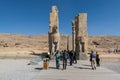 Lots tourists at the Ruins of the Gate of All Nations in the Persepolis in Shiraz, Iran. The ceremonial capital of the Achaemenid