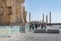 Lots tourists at the Ruins of the Gate of All Nations in the Persepolis in Shiraz, Iran. The ceremonial capital of the Achaemenid Royalty Free Stock Photo