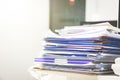 A lots of unfinished documents on office desk. Pile of documents paper. Royalty Free Stock Photo