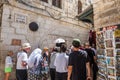 Lots of visitors or pilgrims at station 5 of Via Dolorosa in old city of Jerusalem, Israel