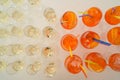 Lots of wine glasses and orange Aperol Spritz cocktails with orange slices and tubes. Royalty Free Stock Photo