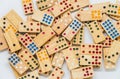 Lots of wooden dominos on white background with selective focus Royalty Free Stock Photo