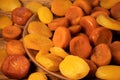 Lots of yellow and orange dried apricots fruits. View from above Royalty Free Stock Photo