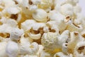 Lots of yummy popcorn on white background Royalty Free Stock Photo