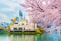 Lotte World amusement park and cherry blossom of Spring, a major tourist attraction in Seoul, South Korea. Royalty Free Stock Photo