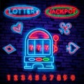 Lottery is a neon sign. Neon logo, emblem gambling, bright banner, neon casino advertising for your projects. Night light Royalty Free Stock Photo