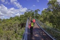 People walks on canopy walkway of Lotterywest Federation Walkway at King`s Park and Botanical Garden in Perth, Australia. Royalty Free Stock Photo