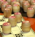 Lotto board game. Wooden lotto barrels and cards. Bingo game. Gambling