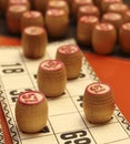 Lotto board game. Wooden lotto barrels and cards. Bingo game. Gambling