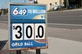 tor, canada - august 1, 2023: lotto 649 5 million dollars thirty dollars gold ball logo sign outside outdoors. p