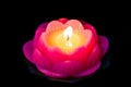 Lotus candle light illuminate a dark surrounding Royalty Free Stock Photo