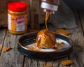 LOTUS ICE CREAM BOMB served in a dish isolated on wooden background side view of dessertingredient, slice, chocolate lava cake, Royalty Free Stock Photo