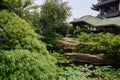 Lotus pond before Chinese traditional building Royalty Free Stock Photo