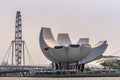 Lotus or shell shaped ArtScience museum and The Flyer behind in Singapore