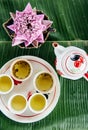 Lotus stamen or lotus pollen tea set. Thai Asian herbal flower tea seving on banana leaves