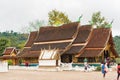 LOUANGPHABANG, LAOS - JANUARY 11, 2017: View of the temple Wat Sensoukaram. Copy space for text. Royalty Free Stock Photo