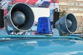 Loud-hailers on police car for message information at emergency. Vintage loudspeakers Royalty Free Stock Photo