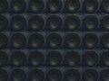 Loud Sound wall: black speakers over leather pattern Royalty Free Stock Photo