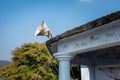 A loud speaker on a building roof of a worshiping place. Uttarakhand India