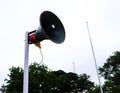 Loud Speaker On A White Pole Front View Royalty Free Stock Photo