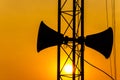 Loudspeaker on pillar and sunset in the evening Royalty Free Stock Photo