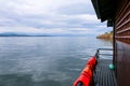 Loudy on sky after the rain, The thai houseboat, float raft downstream on Khuean Srinagarindra Royalty Free Stock Photo