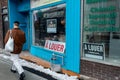 A Louer For Rent in French signs behind store windows during Covid-19 pandemic