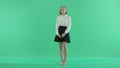 Loughing woman on green screen