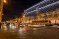 Louis Vuitton, illuminated jewelry and high couture brand name on Champs Elysees avenue in Paris