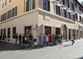 Louis Vuitton Store in Rome, Italy with People Waiting Outside