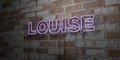 LOUISE - Glowing Neon Sign on stonework wall - 3D rendered royalty free stock illustration