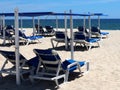 Lounge Chairs On Beach At Praia Do Barril Portugal