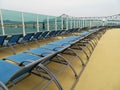 Lounge chairs on a cruise ship deck with views of the Astoria Bridge in Oregon Royalty Free Stock Photo