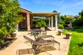 Lounge Chairs & Fire Pit Furniture On Outside Patio