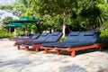 Lounge chairs and sunshades Royalty Free Stock Photo