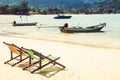 Lounge chairs on a tropical beach Royalty Free Stock Photo