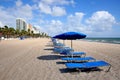 Lounge chairs and umbrellas on Fort Lauderdale Beach Royalty Free Stock Photo