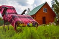 Lounge seat in country side. Green grass lawn and house Royalty Free Stock Photo