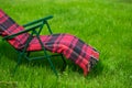 Lounge seat and green grass lawn in country side Royalty Free Stock Photo
