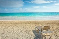 lounge sunbed and secluded eagle beach on Aruba island, Caribbean sea Royalty Free Stock Photo