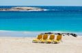 Lounger chairs on sandy beach in Cape Town