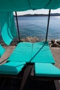 Loungers with baldachin and sea view