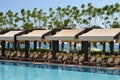 Loungers pool in hotel Royalty Free Stock Photo
