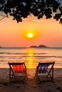 Loungers at the seaside at amazing sunset. Relax.