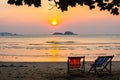 Loungers at the seaside at amazing sunset. Relax.